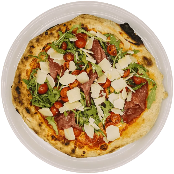 Pizza con jamón, rúcula y parmesano
